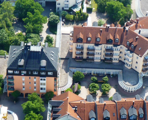 Das Räter-Einkaufs-Zentrum in Heimstetten aus der Vogelperspektive